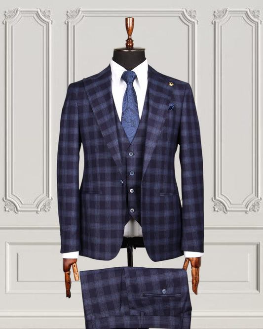 Slim fit dark blue chequered mixed three piece suit with a double breasted waistcoat and peak lapels